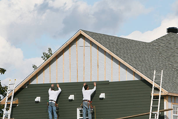 Professional Siding Contractor technician working in Riverside, MD